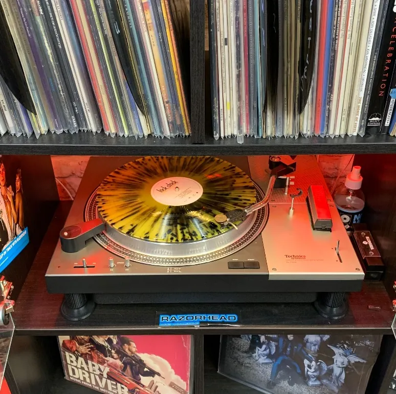 Vinyl record spinning on a Technics turntable at Razorhead